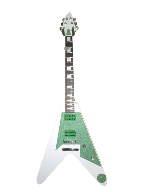 Flying-V-style guitar in white with a green sparkle pickguard.